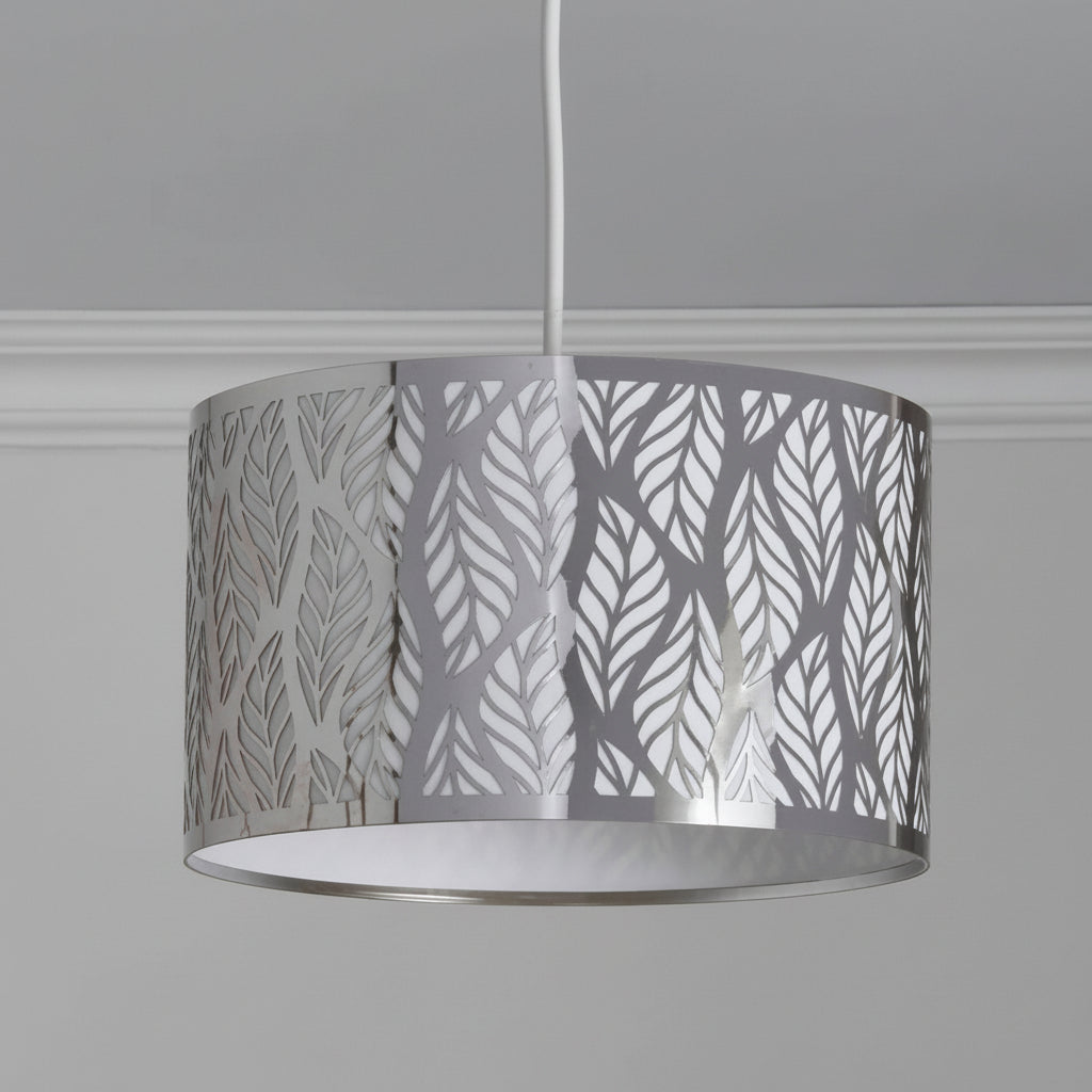 Decorative lampshade with leaf pattern on a plain background