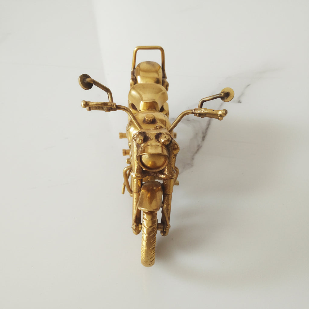 Gold motorcycle model on a white background