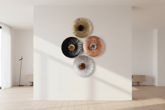 Decorative wall art pieces with floral elements on a light background