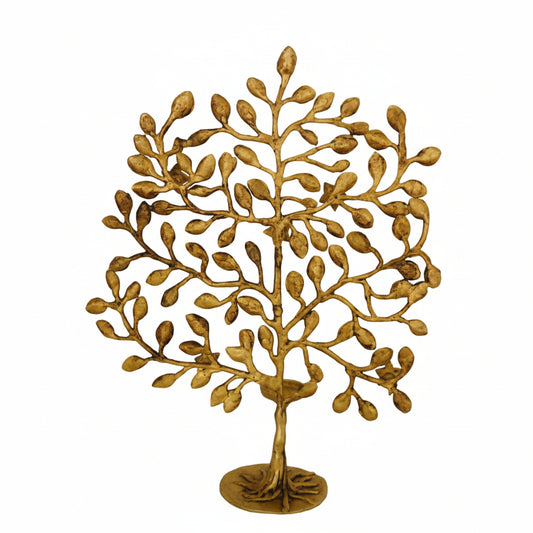 Decorative gold tree sculpture on a white background