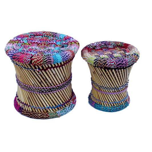 Two colorful stools with woven designs on a white background