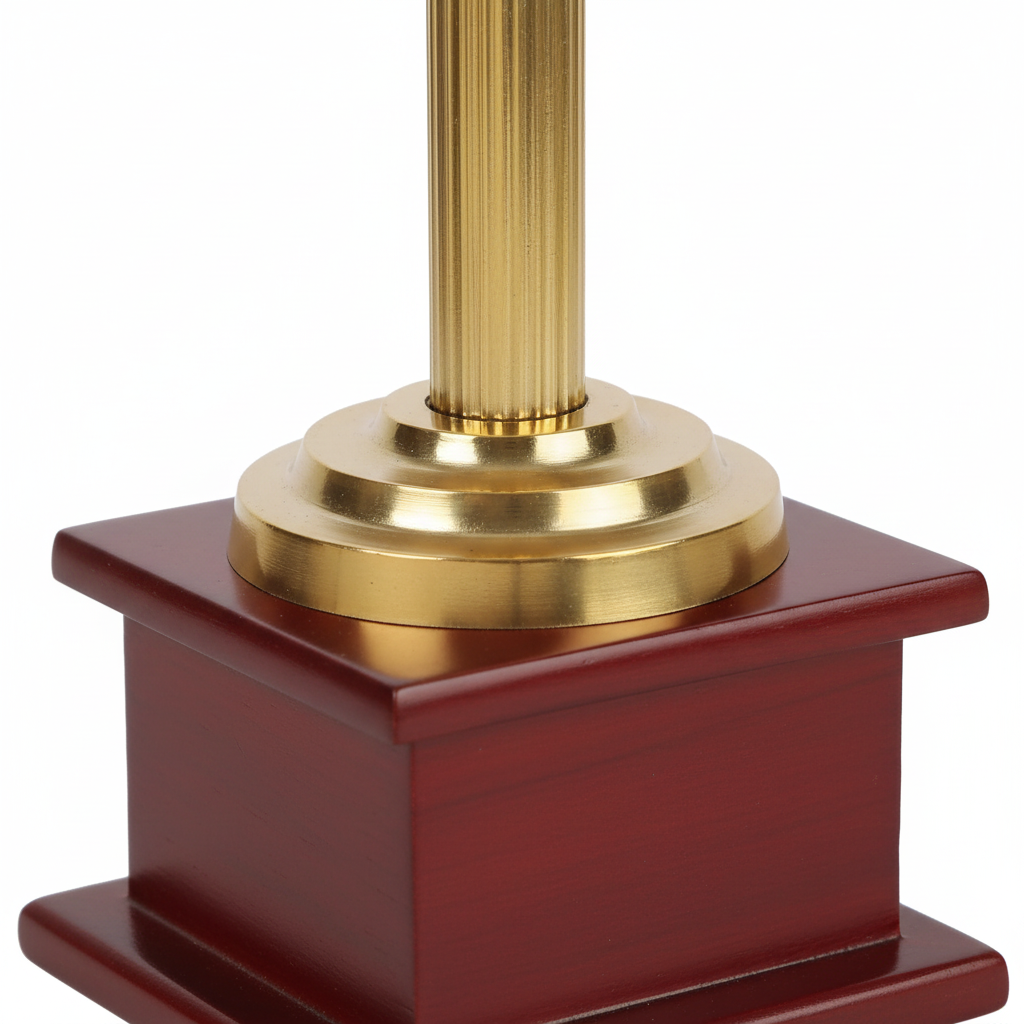 Gold pole on a red base with a white background