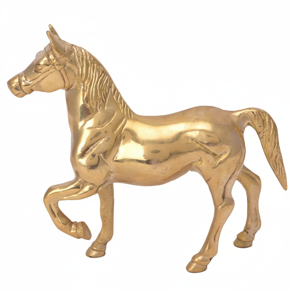 Gold horse figurine on a white background