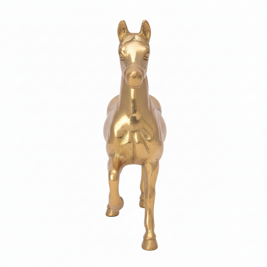Gold horse statue on a white background