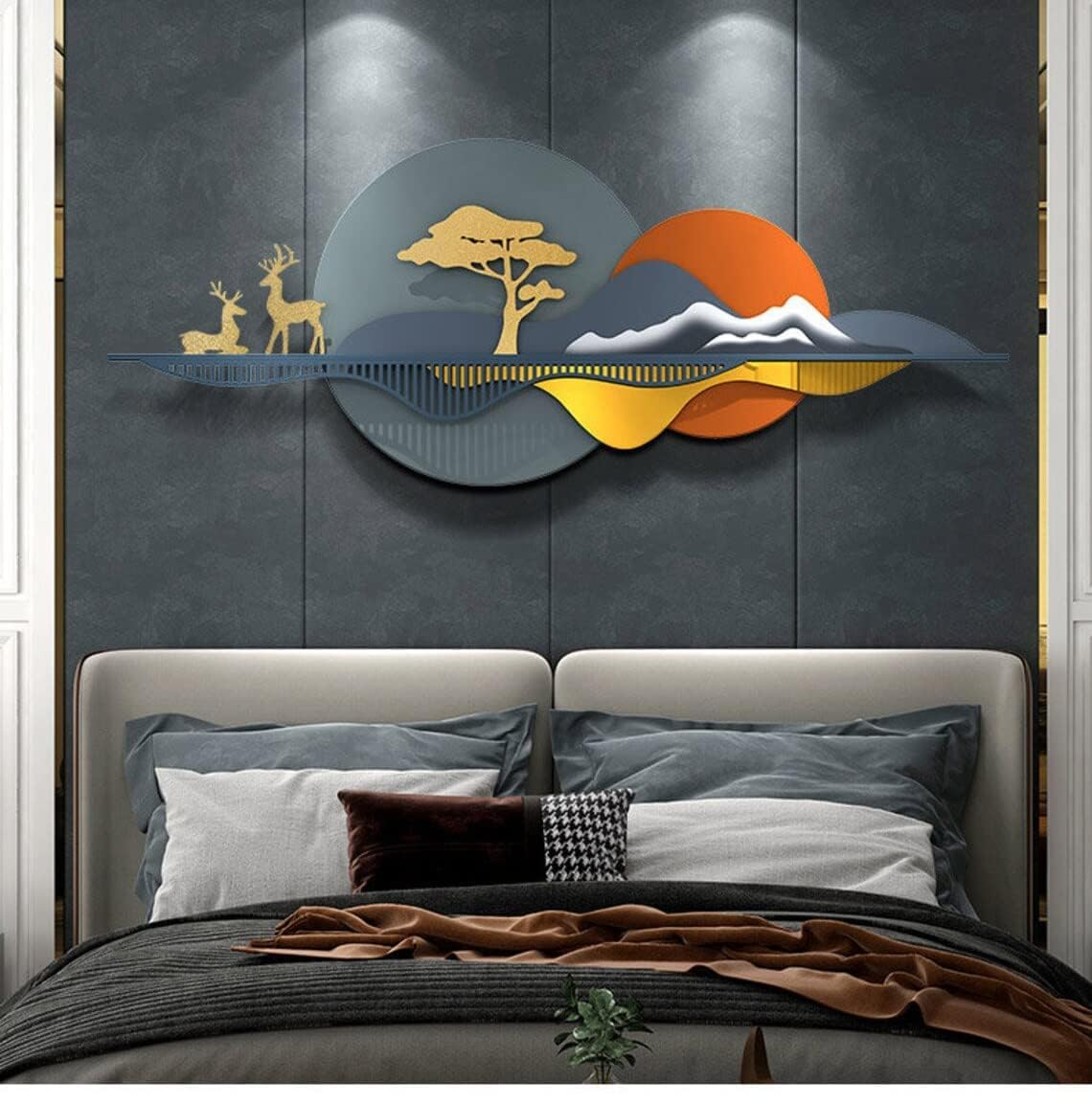 Decorative wall art above a bed with a dark gray wall background