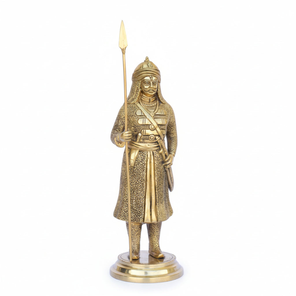 Bronze statue of a warrior holding a spear on a white background