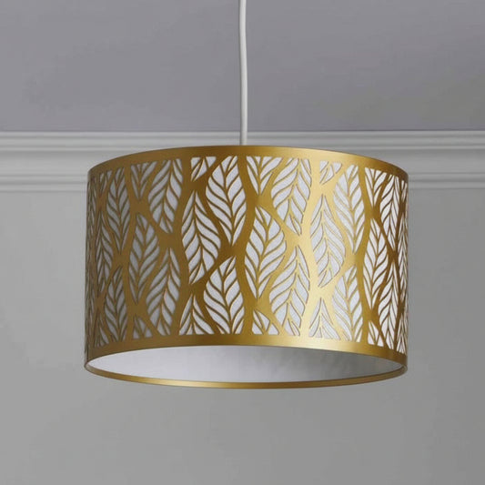 Gold leaf-patterned lampshade on a gray background