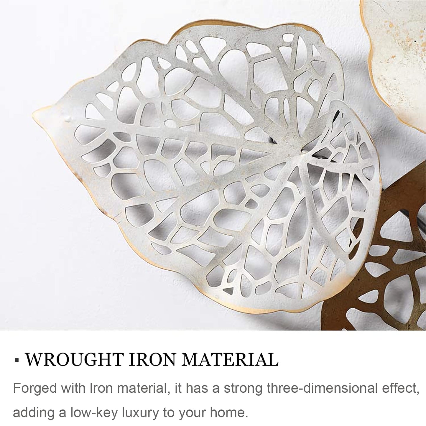 Decorative leaf-shaped object with intricate cut-out design on a white background