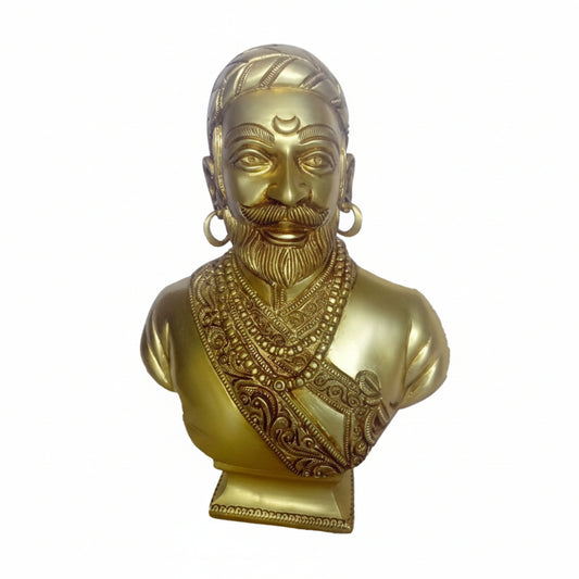 Gold-colored bust of a man with intricate detailing on a white background