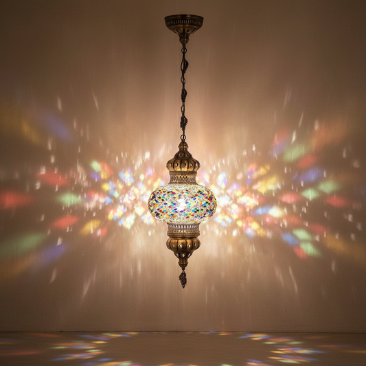 Decorative hanging lamp with colorful mosaic design against a dark background