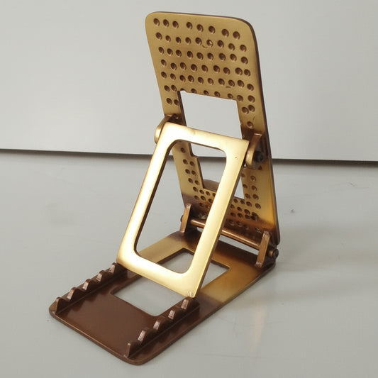 Bronze-colored folding chair with a textured surface on a white background