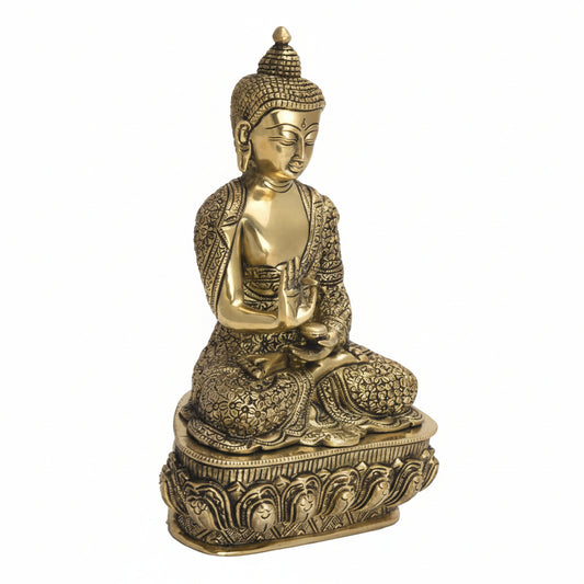 Gold-colored Buddha statue on a white background