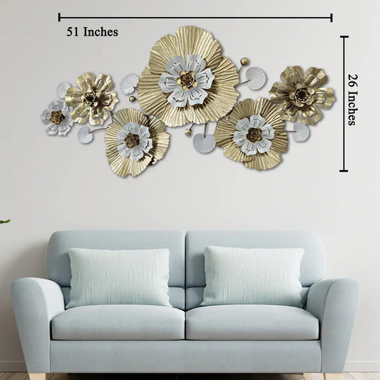 Decorative wall art with flowers above a light blue sofa, showing dimensions.