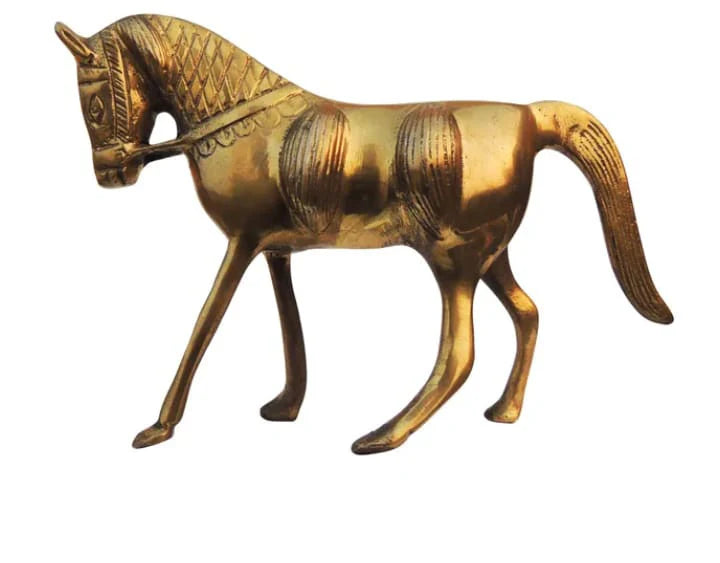 Brass horse figurine on a white background