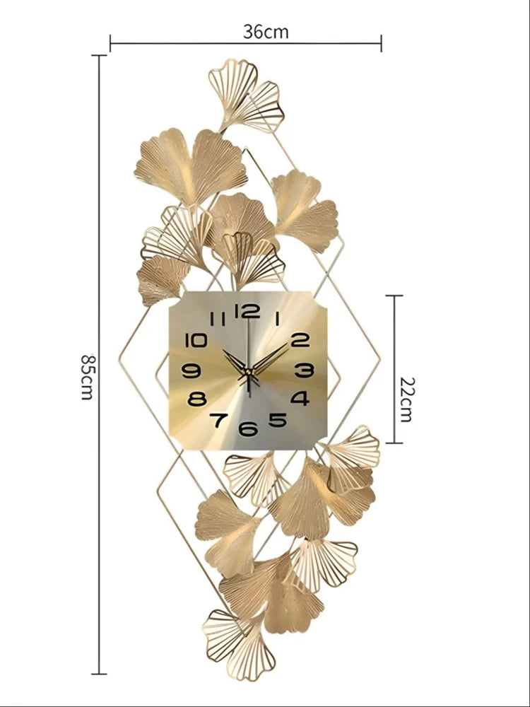 Gold leaf wall clock with dimensions on a white background