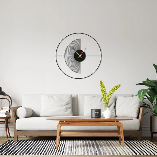 Modern living room with a white sofa, wooden coffee table, and decorative wall clock.