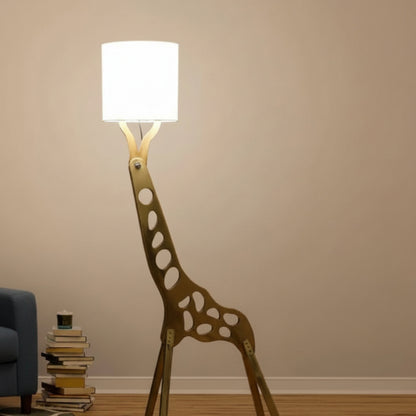 Giraffe-shaped floor lamp with a white shade in a room setting.