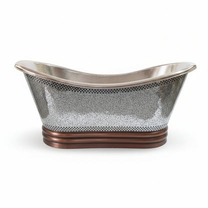 Decorative metal basin with textured surface on a white background