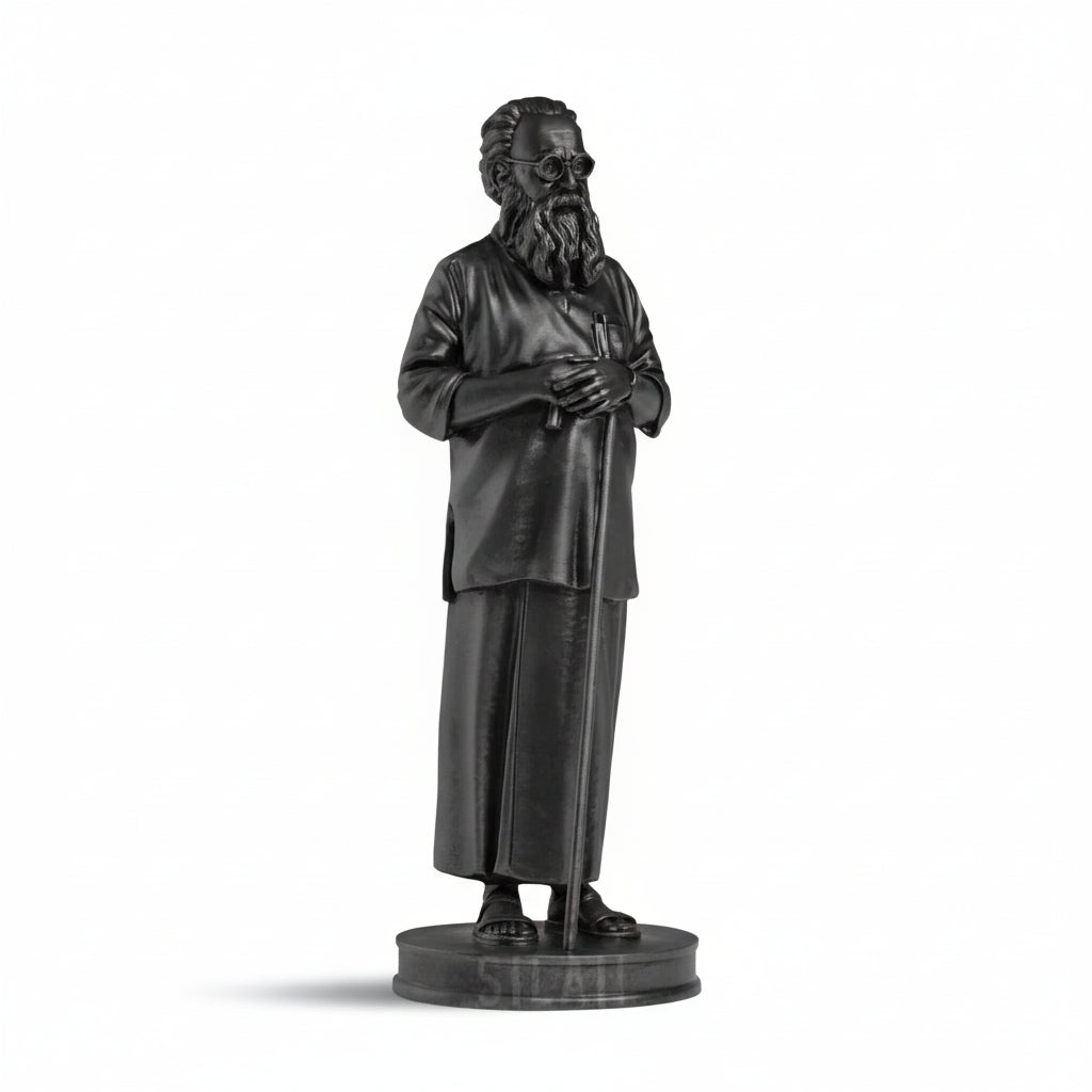 Statue of a bearded figure in robes on a gray background