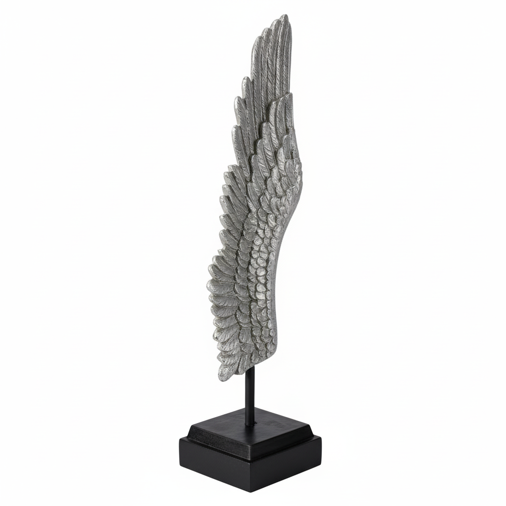Decorative sculpture of a wing on a stand with a white background