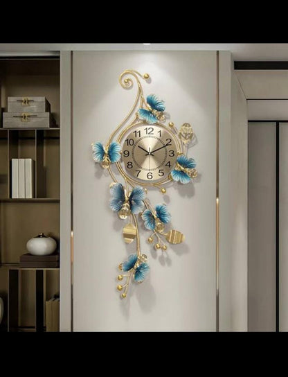 Decorative wall clock with floral design on a wall