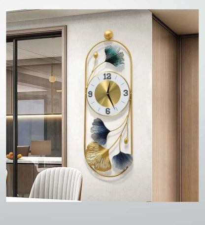 Decorative wall clock with floral design on a white wall.