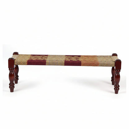 Decorative bench with a colorful woven seat and gray wooden legs on a white background
