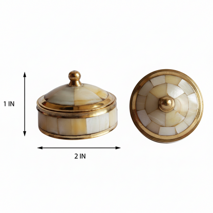 Decorative box with gold trim and white pattern, shown open and closed, on a white background.