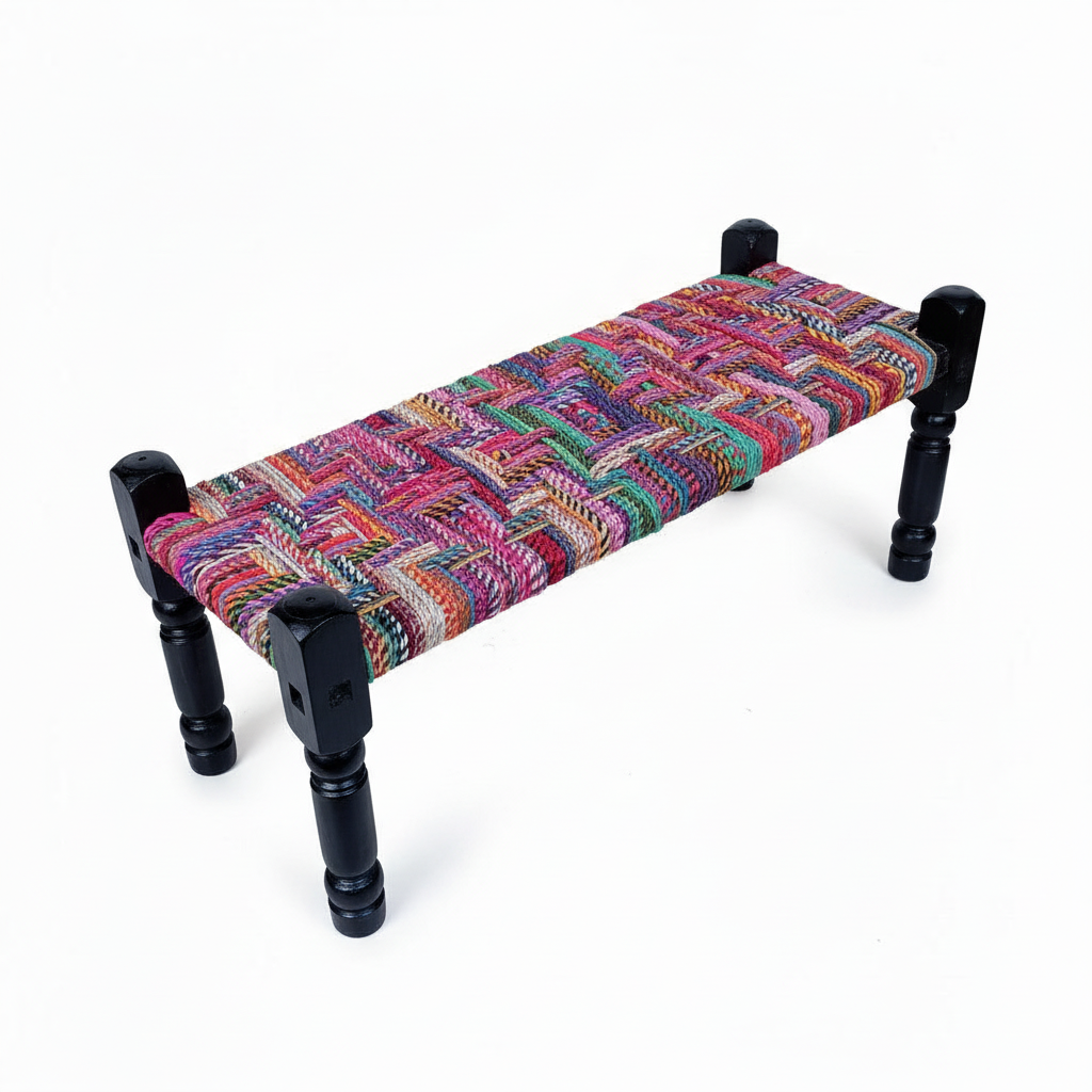 Colorful woven bench with black wooden legs on a white background