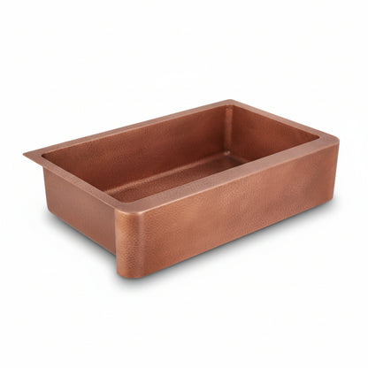 Copper kitchen sink on a white background