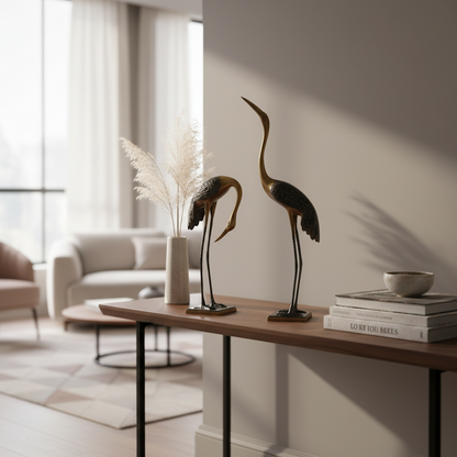 Decorative statues on a table in a living room setting