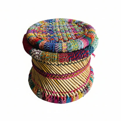 Colorful woven stool on a marble floor