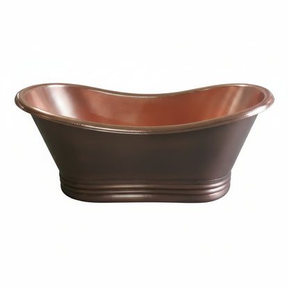 Copper bathtub on a concrete floor with cardboard boxes in the background