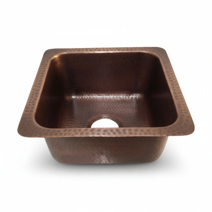 Copper kitchen sink on a white background