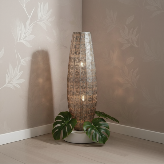 Decorative lamp with intricate pattern on a neutral background