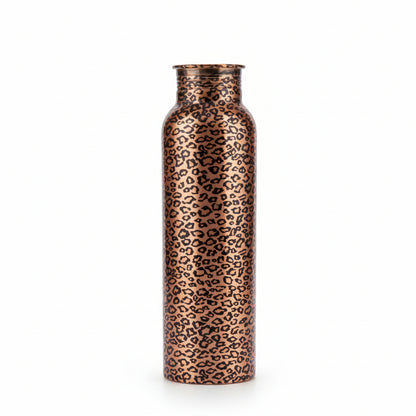 Leopard print water bottle held by a hand with a blurred background