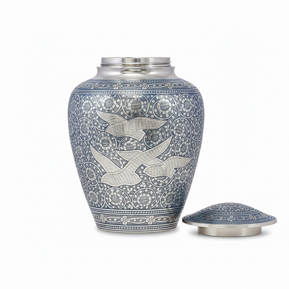 Decorative urn with bird patterns on a white background