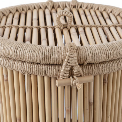 Close-up of a woven basket with natural brown color and rope handle.