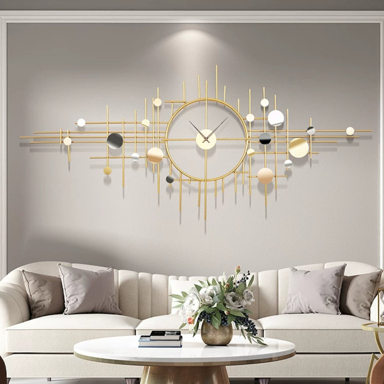 Decorative wall clock with gold accents in a living room setting.