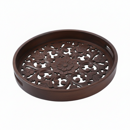 Decorative brown round tray with intricate floral patterns on a white background