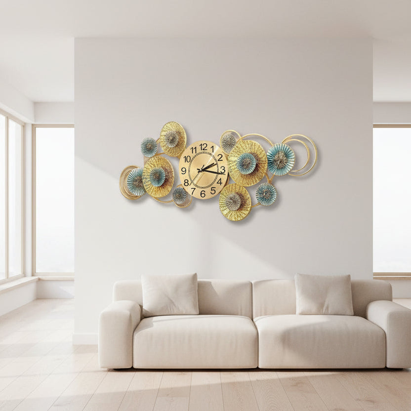 Decorative wall clock with floral designs on a white background