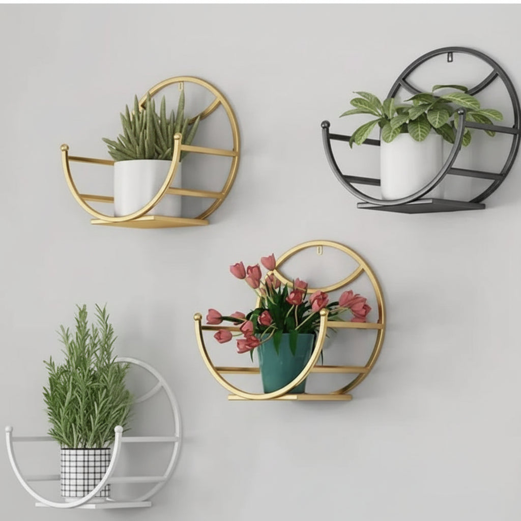 Decorative wall planters with plants on a light gray background