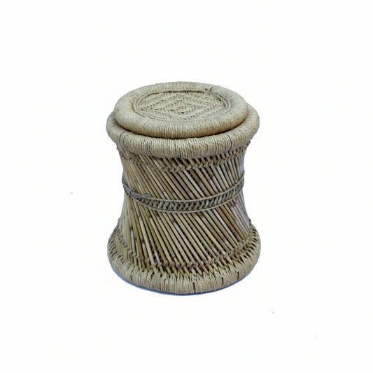 Rattan stool with woven design on a white background