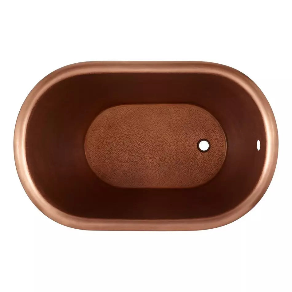 Copper bathtub with a brown leather-like cover on a white background