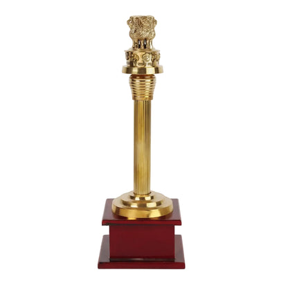 Gold trophy with a red base on a white background