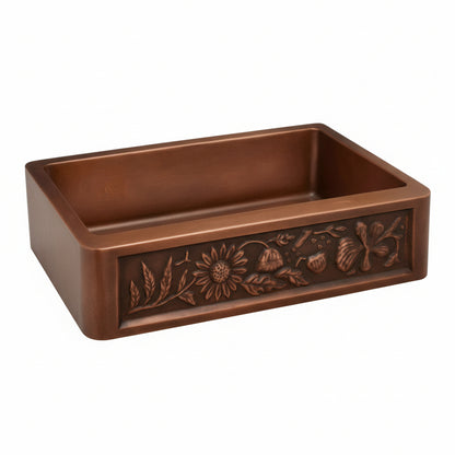 Brown rectangular tray with floral embossing on a white background