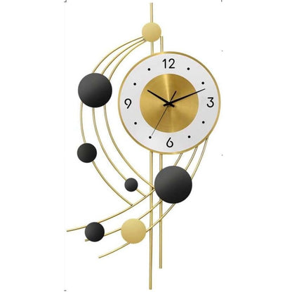 Decorative wall clock with gold and black design on a white background