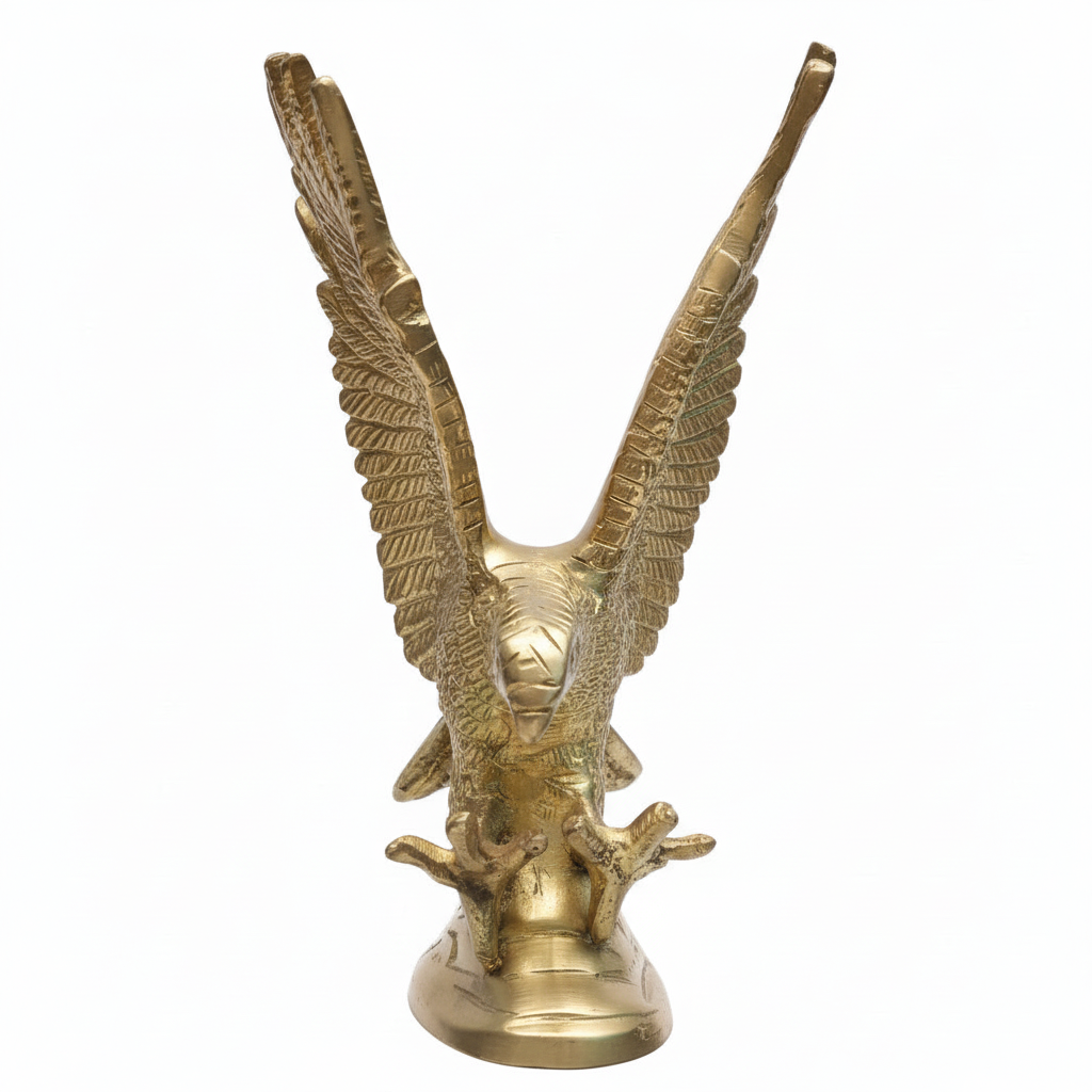 Gold eagle statue on a white background