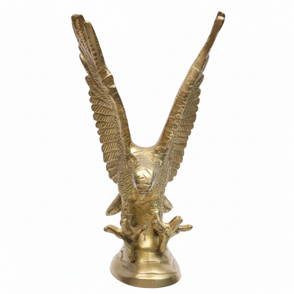 Gold eagle statue on a white background