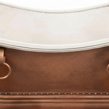 Close-up of a brown leather suitcase with a white top and gold handle.